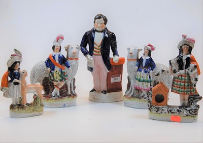 Lot 245 - A 19th century Staffordshire pottery figure of...