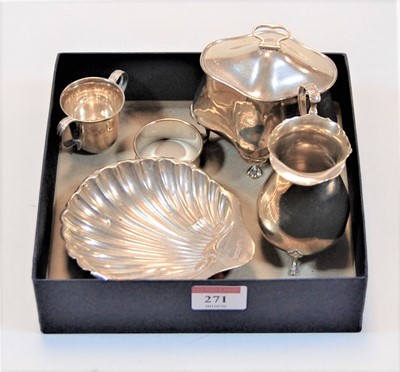 Lot 271 - A silver milk jug, standing on three hoofed...