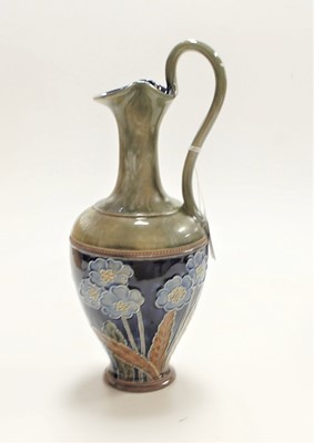 Lot 230 - A Royal Doulton stoneware ewer, on a...