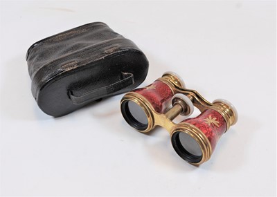 Lot 445 - A pair of early 20th century red enamelled and...