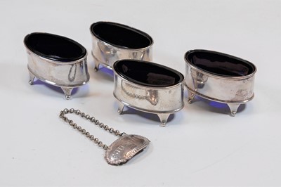 Lot 457 - A set of four George V silver open salts, each...