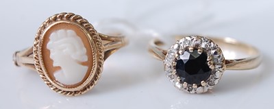 Lot 312 - A contemporary 9ct gold, blue and white...