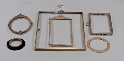 Lot 488 - A 19th century gilt metal photo frame of...