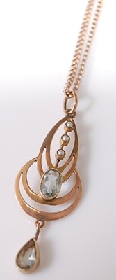 Lot 363 - An Edwardian 9ct gold and blue peridot and...