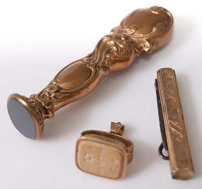 Lot 373 - An engraved yellow metal and steel small...