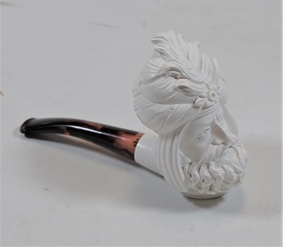 Lot 493 - A modern Meerschaum type pipe, the bowl carved...