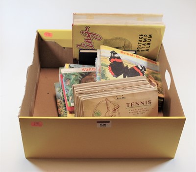 Lot 520 - A box of assorted collectors cards to include...