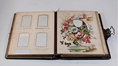 Lot 548 - A Victorian tooled leather bound photograph album
