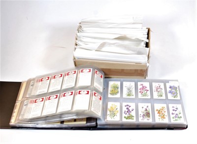 Lot 572 - A box of first day covers together with an...