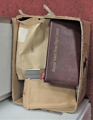 Lot 573 - A box containing a collection of stamps and...