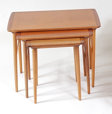 Lot 301 - A Danish teak nest of three occasional tables,...