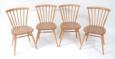 Lot 349 - A set of four 1960s Ercol blond elm stickback...