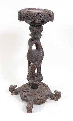 Lot 1372 - A circa 1900 Burmese carved hardwood...