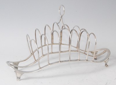 Lot 1117 - A late Victorian silver six-division toastrack,...