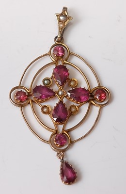 Lot 2571 - A yellow metal Edwardian openwork garnet and...