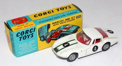 Lot 1664 - A Corgi Toys No. 324 Marcos 1800 GT comprising...