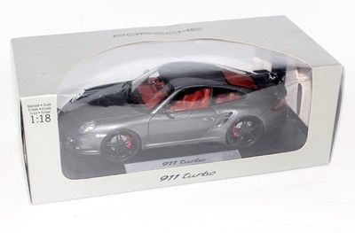 Lot 2769 - A Norev boxed Porsche design driver's...