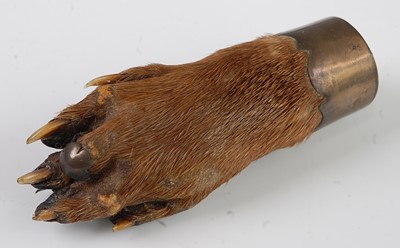 Lot 554 - * A taxidermy Otter (Lutra lutra) pad brooch,...
