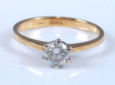 Lot 2629 - An 18ct yellow and white gold diamond single...
