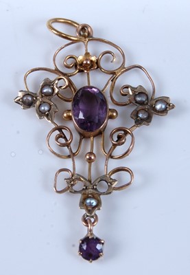 Lot 2637 - An Edwardian yellow metal openwork pendant,...