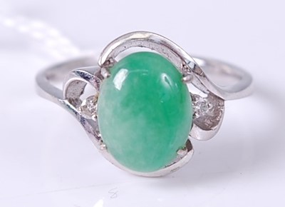 Lot 301 - A 14ct white gold cabochon jade and twin...