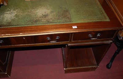 Lot 1188 - A reproduction mahogany and gilt tooled green...
