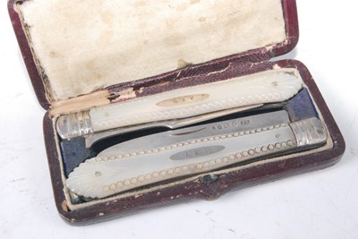 Lot 1144 - A cased pair of mid-Victorian silver and...