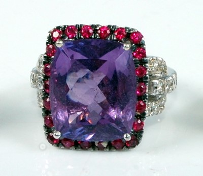 Lot 1228 - A white metal, amethyst, ruby and diamond...