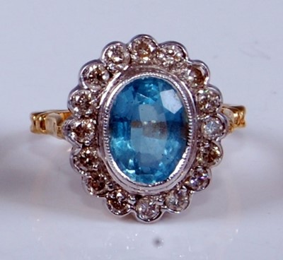 Lot 1229 - A yellow and white metal, aquamarine and...