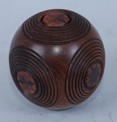 Lot 1330 - A carved treen puzzle ball, inlaid with...