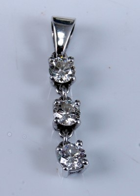 Lot 1239 - A white metal diamond three stone articulated...