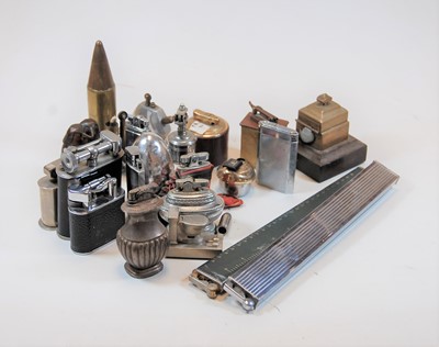 Lot 284 - A box of assorted cigarette lighters to...