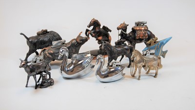 Lot 285 - A novelty table lighter in the form of an...