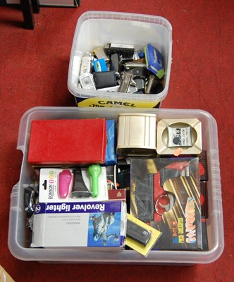 Lot 300 - Two boxes of miscellaneous cigarette lighters...