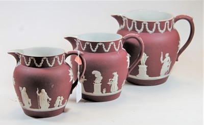 Lot 33 - A set of three Wedgwood 'Red' jasperware...