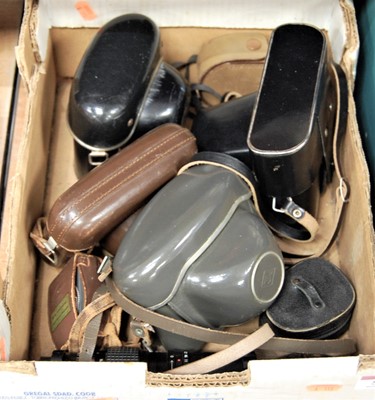 Lot 58 - A box of cameras and accessories, principally...