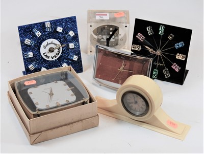 Lot 96 - A blue glitter finish perspex mantel clock,...