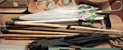 Lot 124 - A collection of assorted parasols and walking...