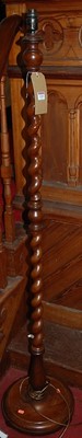 Lot 1105 - An early 20th century walnut spiral turned...