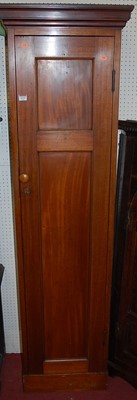 Lot 1113 - A mahogany narrow single door side cupboard...