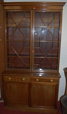 Lot 1122 - A circa 1900 mahogany bookcase cupboard,...