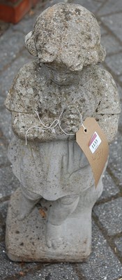 Lot 1133 - A reconstituted stone garden figure of a...