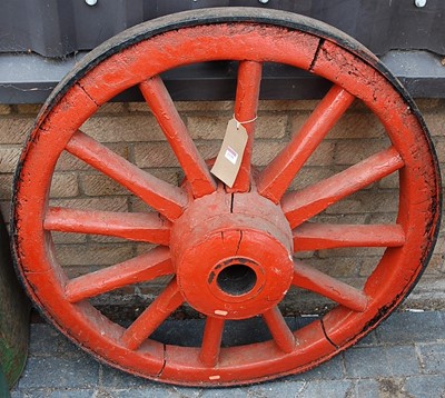 Lot 1135 - A red painted wood and cast iron bound single...