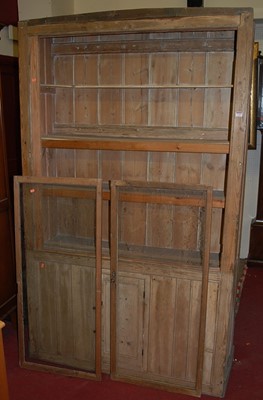 Lot 1146 - A reclaimed panelled pine side cupboard,...