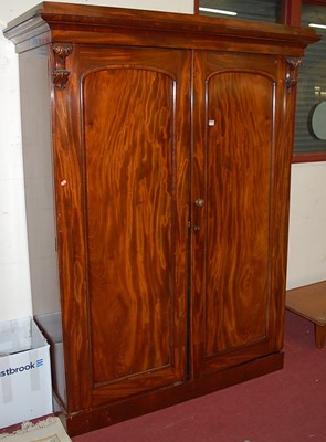Lot 1149 - A mid-Victorian mahogany double door gentleman'...