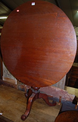 Lot 1174 - A 19th century mahogany circular tilt-top...