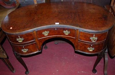 Lot 1177 - An early 20th century figured walnut and...