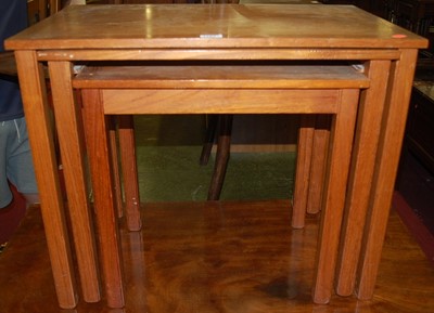 Lot 1184 - A 1970s Danish teak nest of three occasional...