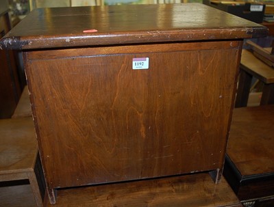 Lot 1192 - An early 20th century stained pine hinge...