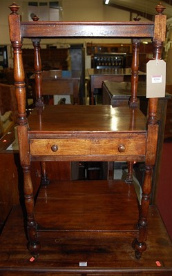Lot 1204 - A 19th century mahogany square three-tier...